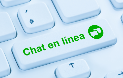 Tecla del teclado con la frase 'Chat en línea' y un ícono de conversación.